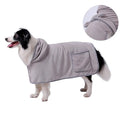 Blue adjustable dog bath robe towel drying a golden retriever after a bath.