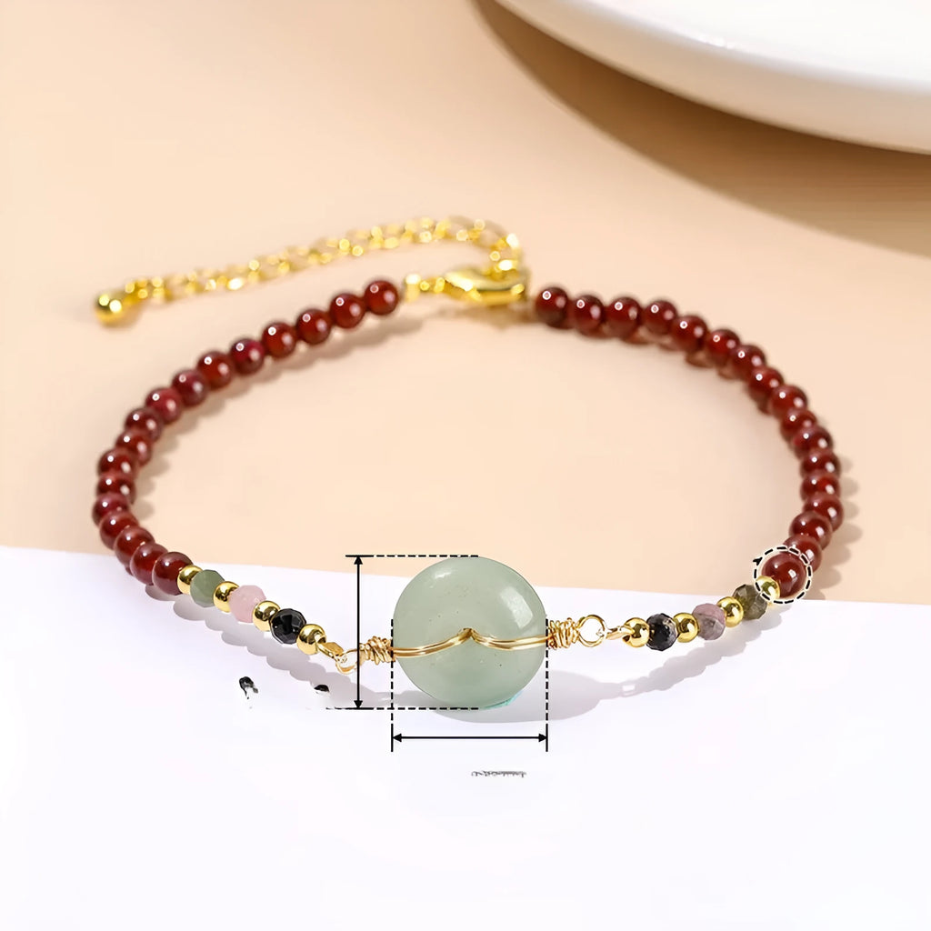 Women's Chinese crystal agate bracelet with round elements and garnet safety buckle