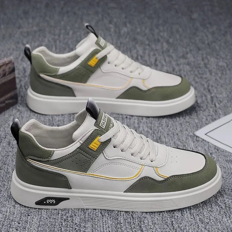 Men's low-top casual canvas shoes in beige with leather stitching detail on a white background.