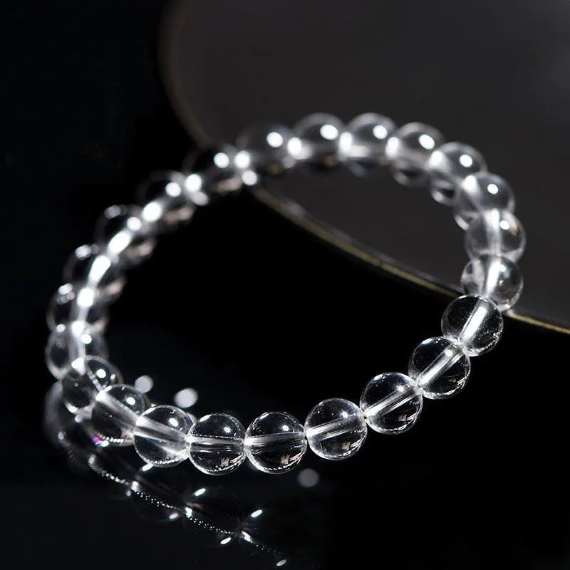 Natural Donghai white water crystal bead bracelet with geometric round beads on a wrist.