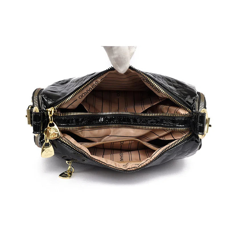 PU leather Boston pillow bag in khaki with stitched seams and stone pattern, double shoulder straps, internal pocket