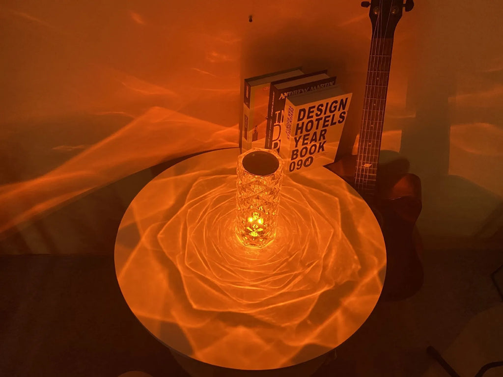 Romantic LED rose diamond table lamp with crystal-like PAMA acrylic construction on a table