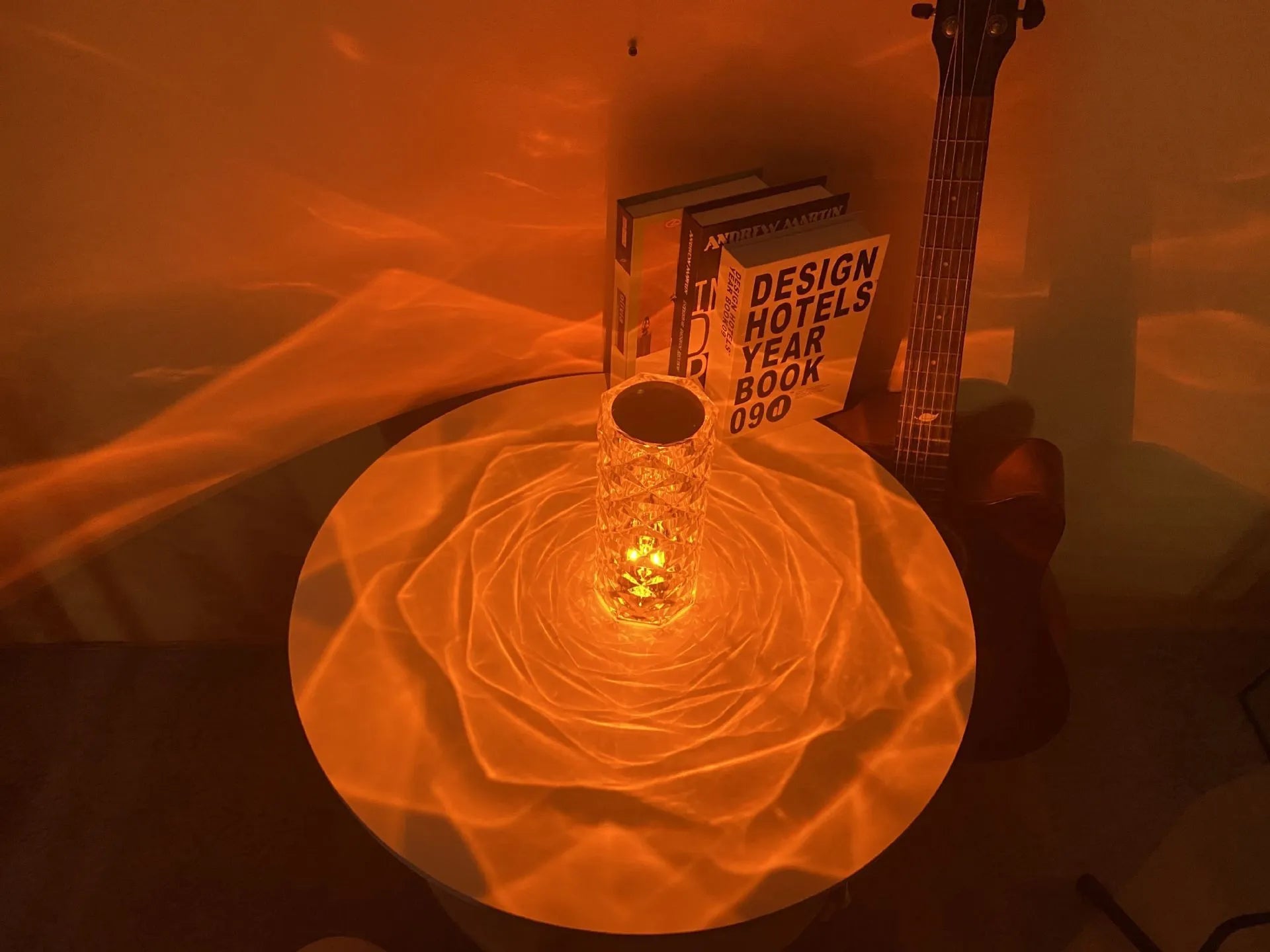 Romantic LED rose diamond table lamp with crystal-like PAMA acrylic construction on a table