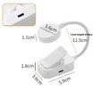 White plastic rechargeable LED book clip light clipped onto a book with USB charging cable