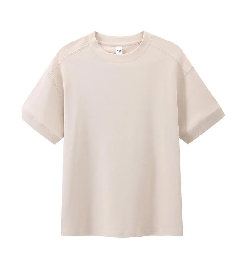 Breathable cotton pique short-sleeved T-shirt in a loose pullover style on a solid colour background.
