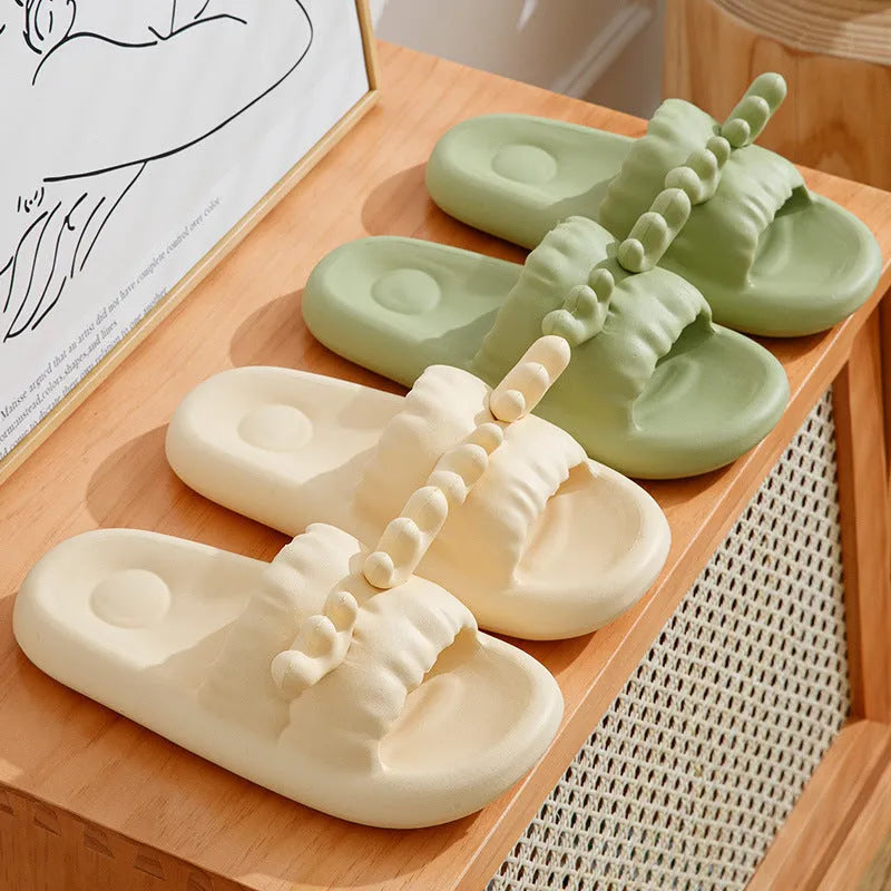 Deer horn design EVA flip flop slippers in light yellow, showing hollow out pattern and non-slip sole.