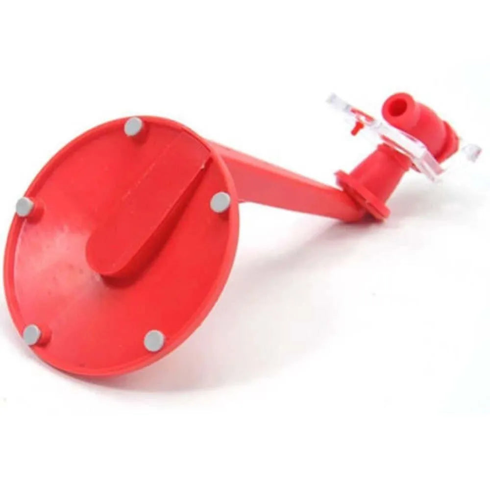 Red plastic Magic Tap soda dispenser attached to 2-liter bottle showing push-in tap mechanism