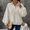 Milky white women's sweater with a textured polo collar and long sleeves