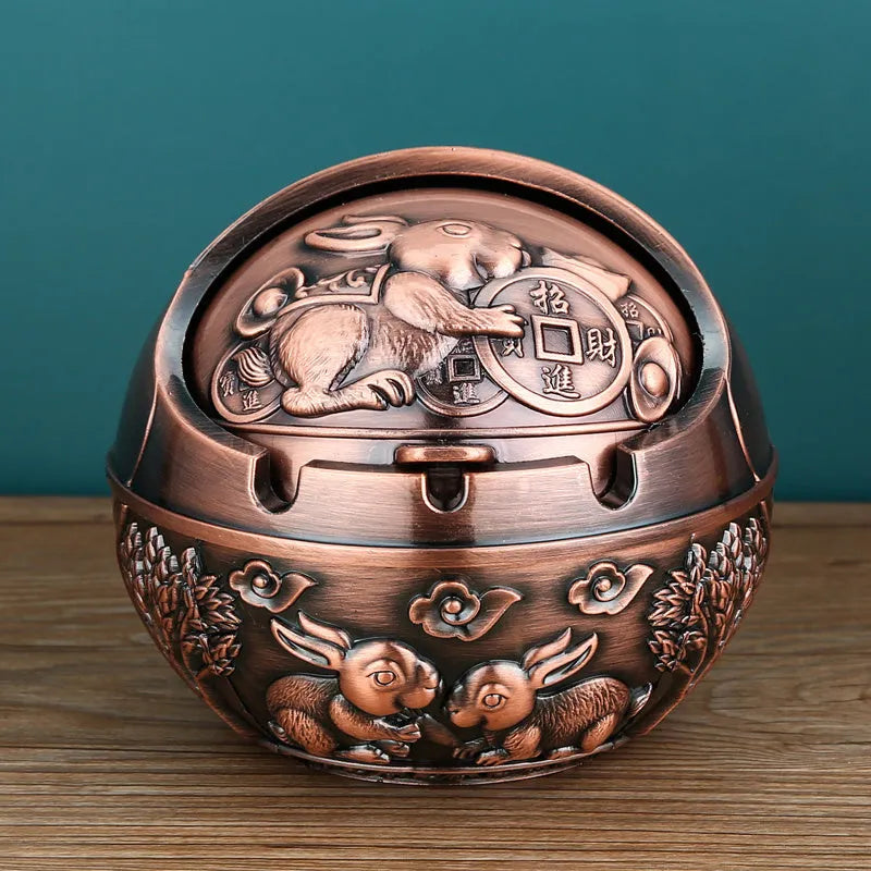 Creative bronze and red copper alloy ashtray with smoke extinguishing slot in various decorative styles.