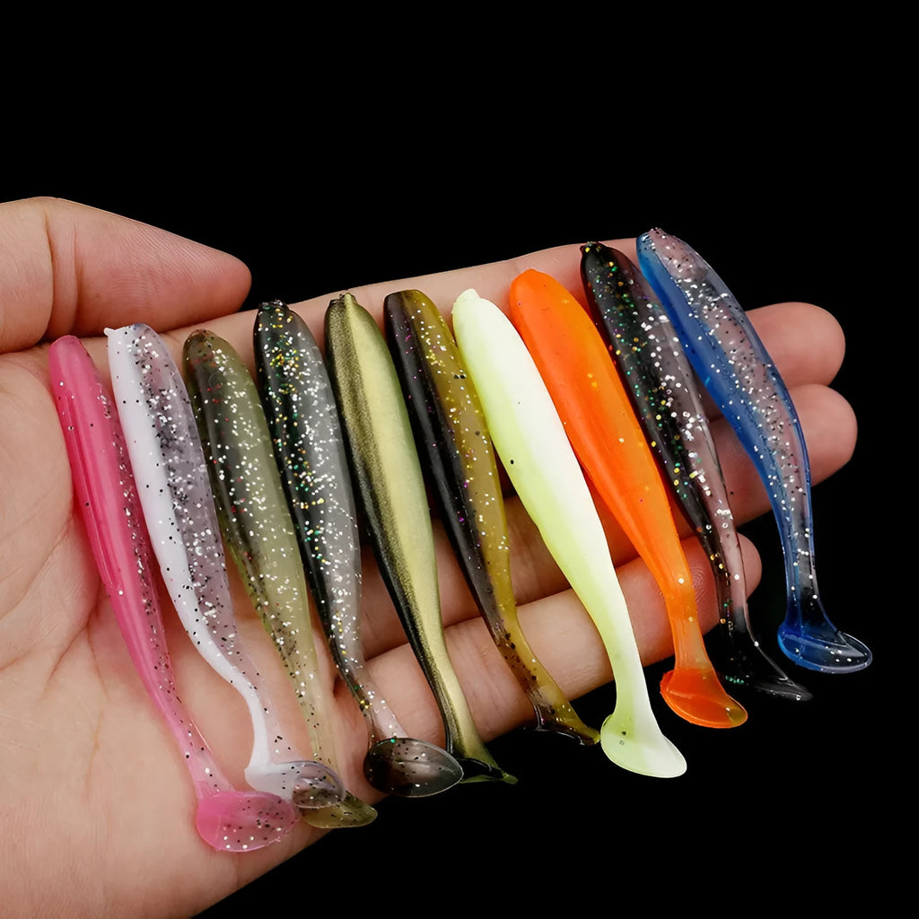 Two-tone soft plastic T-tail fishing lure measuring 7cm, shown in multiple colour variations.
