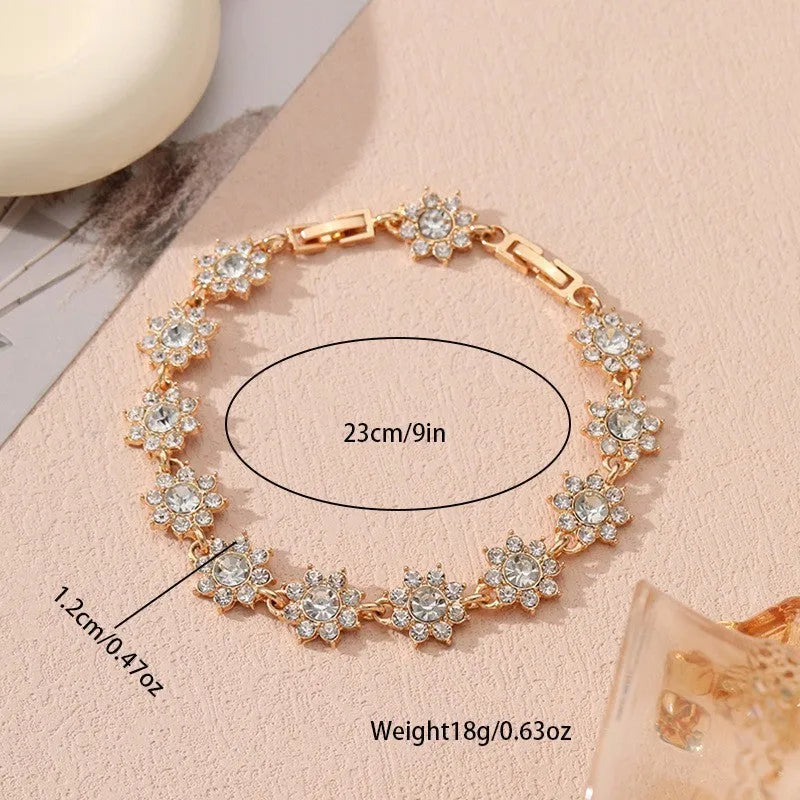 Electroplated zinc alloy flower bracelet with colourful crystal and diamond stones in gold and silver colour finishes