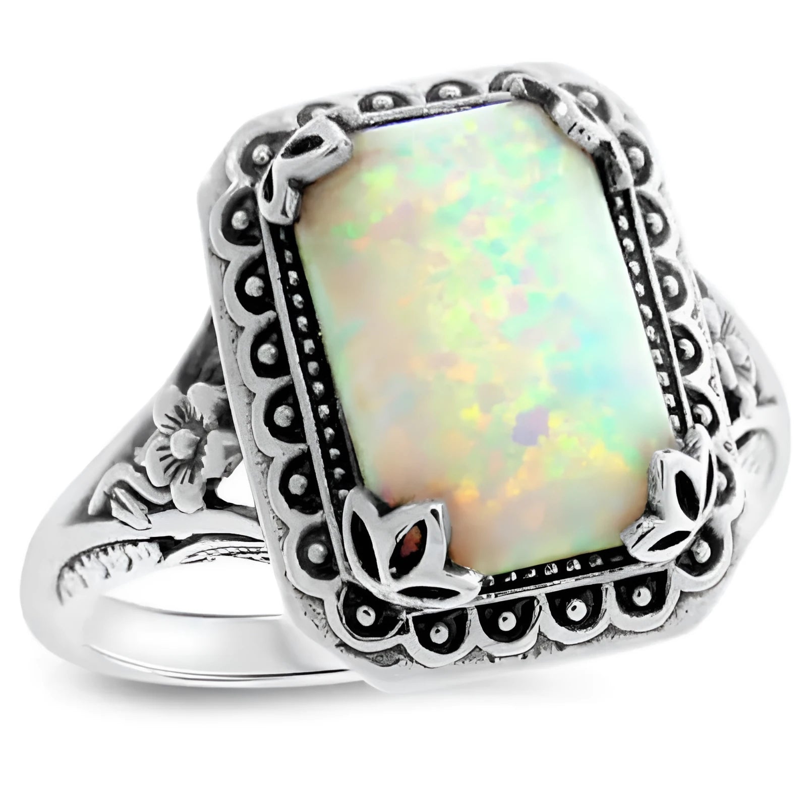 Silver alloy geometric ring with inlaid opal stone on a white background