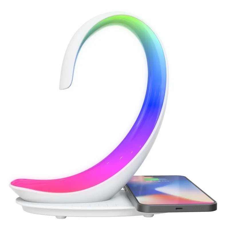 White swan-shaped desktop lamp with wireless charging pad and Bluetooth speaker functions, colourful LED lighting