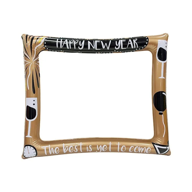 Red and green Christmas-themed inflatable photo frame held by a person.