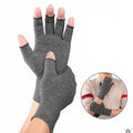 Grey half-finger joint compression gloves laid flat, showing the elastic spandex fabric and exposed fingertips.