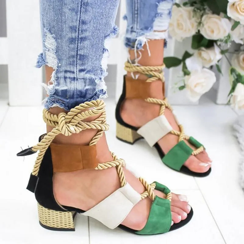 Women's beige suede sandals with thick heel, fish mouth toe, and front ankle strap.