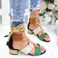 Women's beige suede sandals with thick heel, fish mouth toe, and front ankle strap.