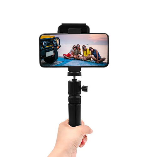 Silver aluminium alloy phone bracket for iPhone shown in clip and tripod style next to a mobile phone.
