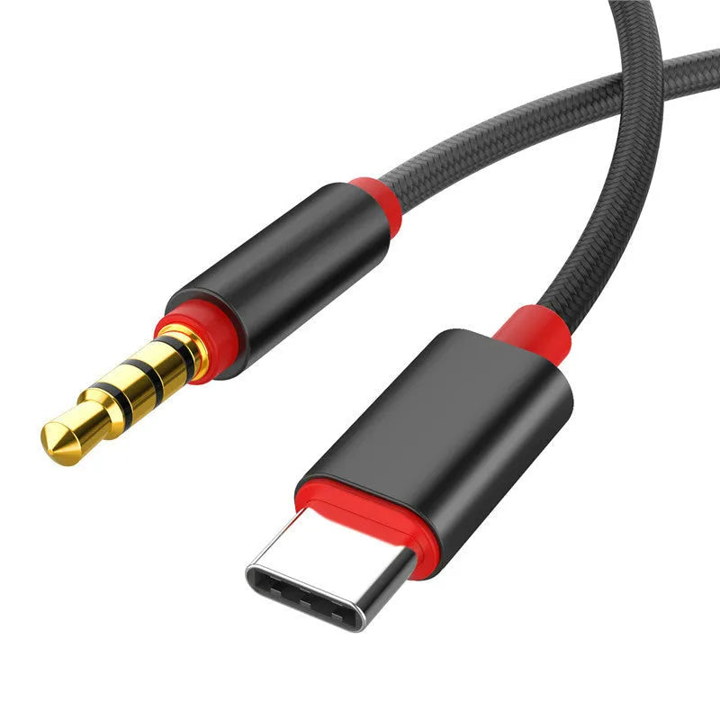 Silver and black nylon audio cable with 3.5mm connectors in three different lengths.
