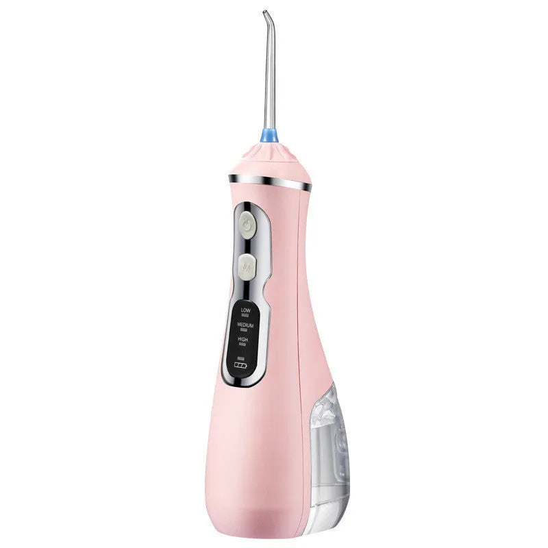 Portable oral irrigator in black, pink or white with rotating nozzle and USB charging cable