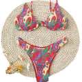 Red floral print women's underwire bikini top and briefs on a mannequin.