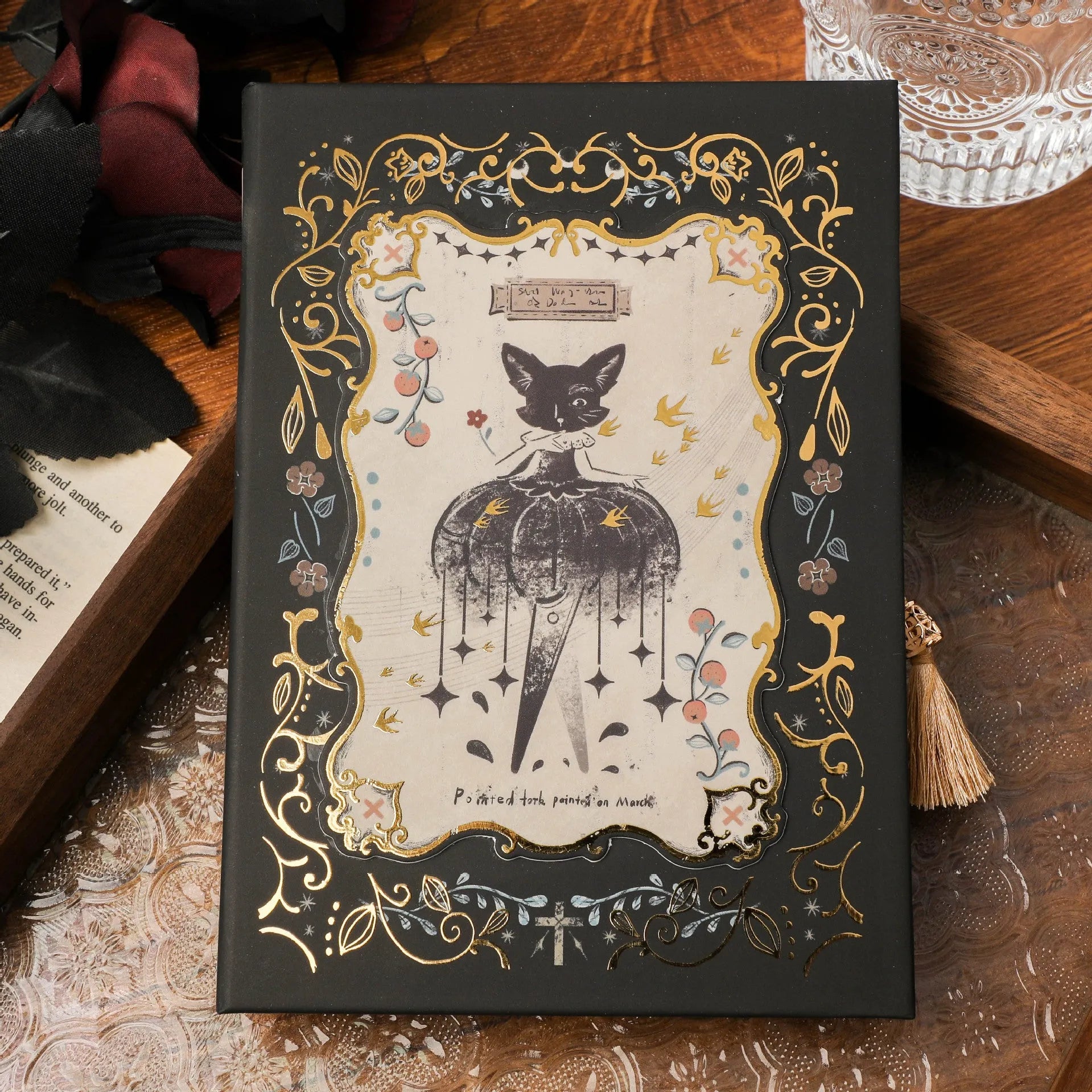 THALO A5 retro gothic style notebook showing cover design options on a wooden table.