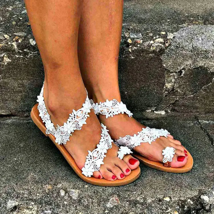 White women's flat shoes with rhinestone floral patterns and round toe design