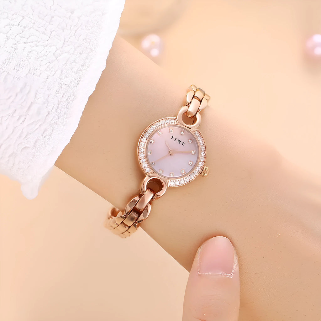 Women's fashion bracelet watch with alloy band, stainless steel buckle, 23mm case, and round or square dial.