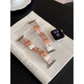 Elastic embossed dragonfly watch band for Apple Watch, stretchable single-circle design, available in 125mm and 135mm lengths