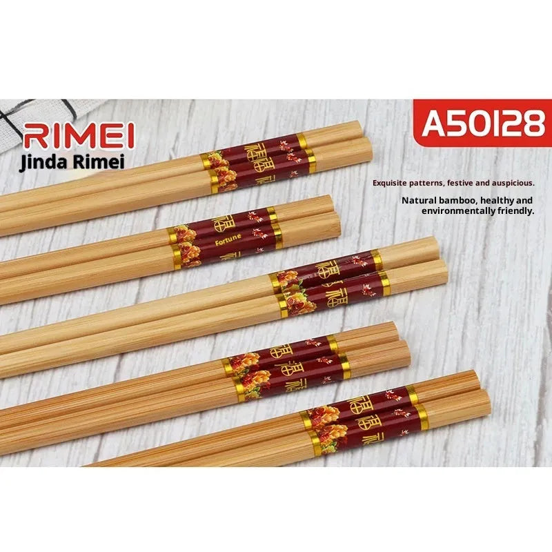 10 pairs of solid colour bamboo chopsticks on a plain surface, household kitchen use