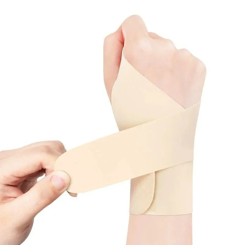 Adjustable black and skin-colour athletic wristguards for left and right hands, shown for sports like badminton and tennis.