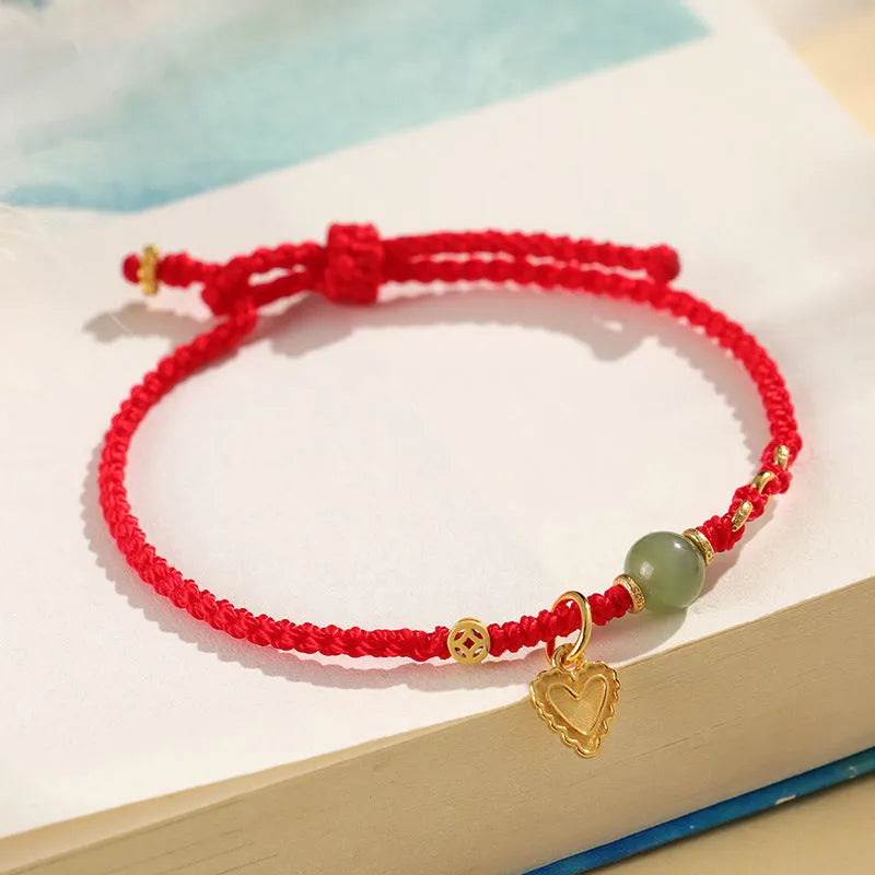 Handmade 925 silver and Hetian jade woven bracelet for women with red strap