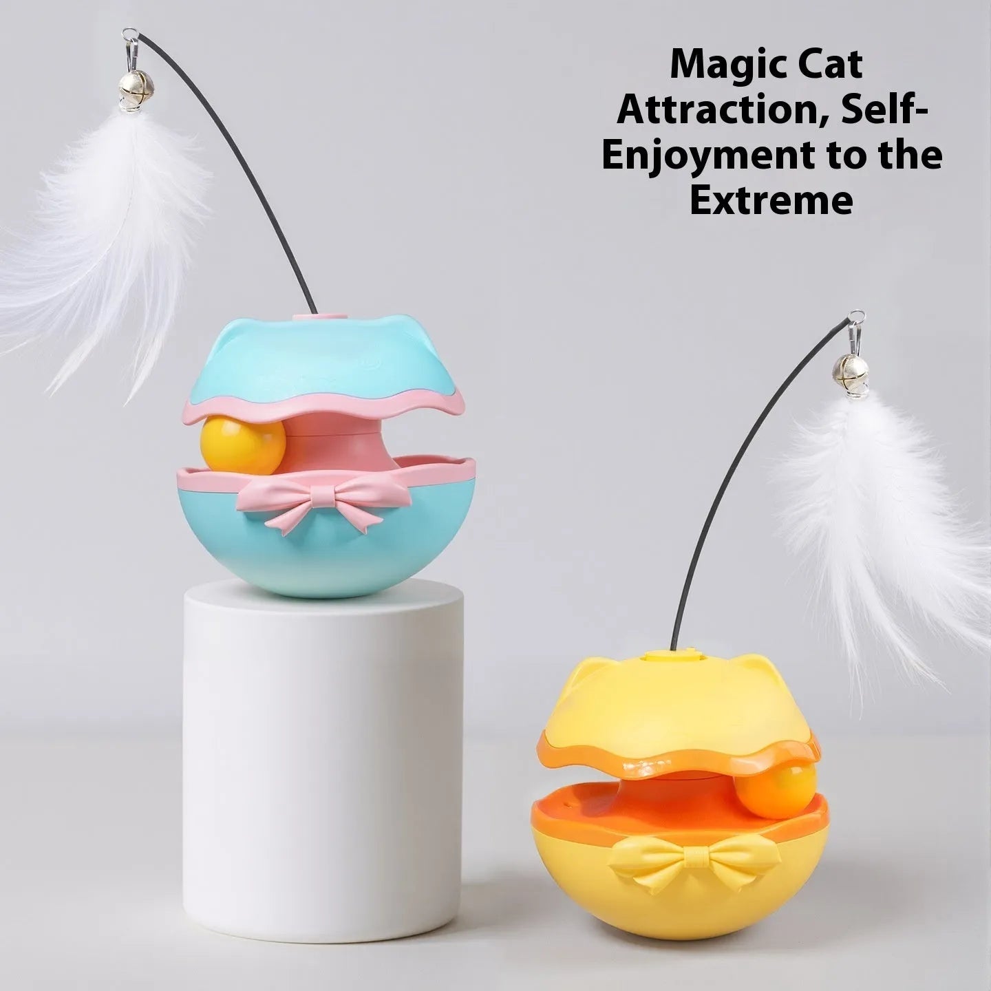 Electric cat toy tumbler ball in soft fog grey colour, showing smooth plastic surface and on/off switch on base.