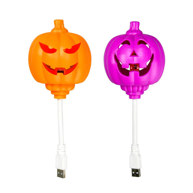 USB rechargeable plastic pumpkin lamp with purple or yellow LED lighting measuring 8.3cm diameter