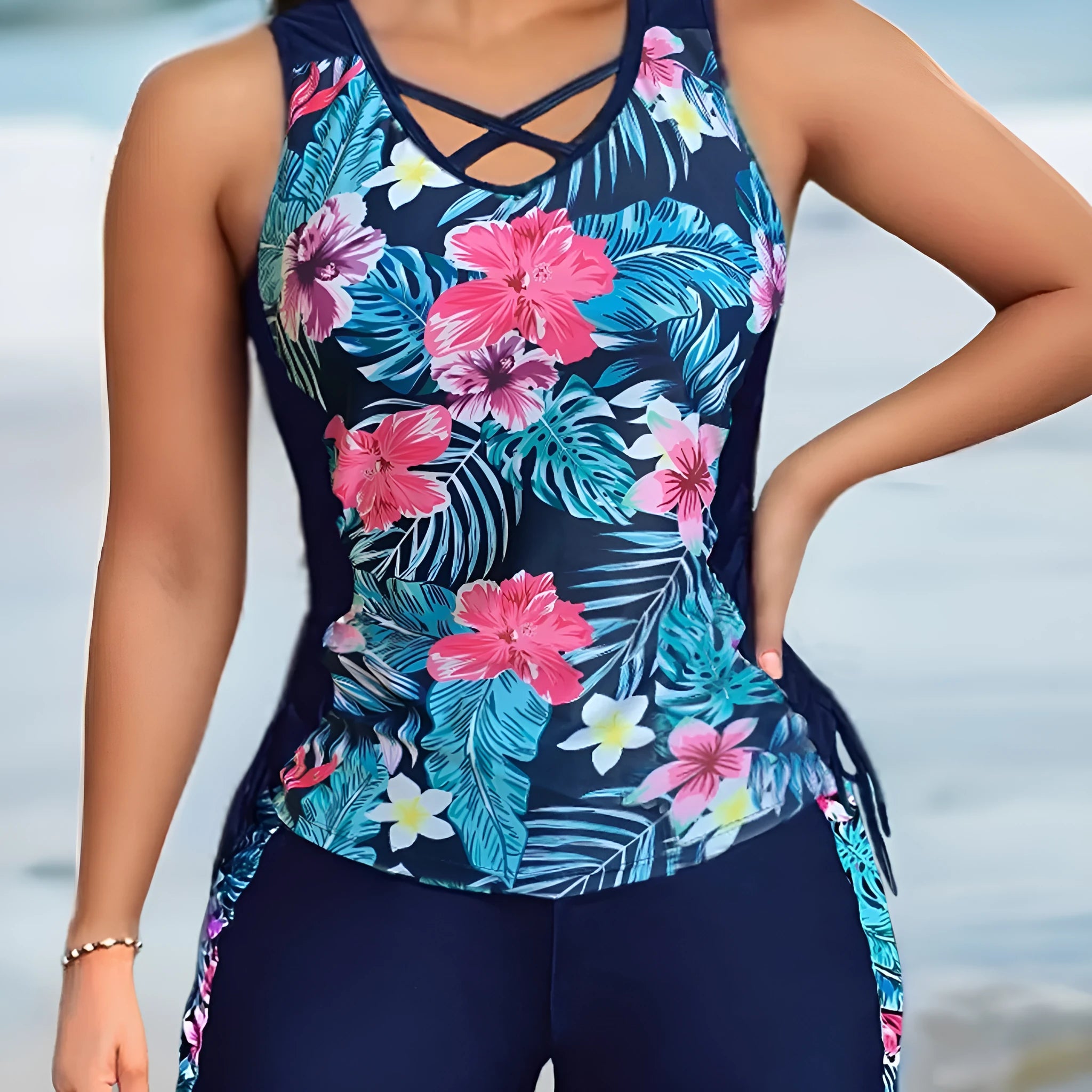 Women's plus size floral print high-waisted bikini swimsuit in navy blue.