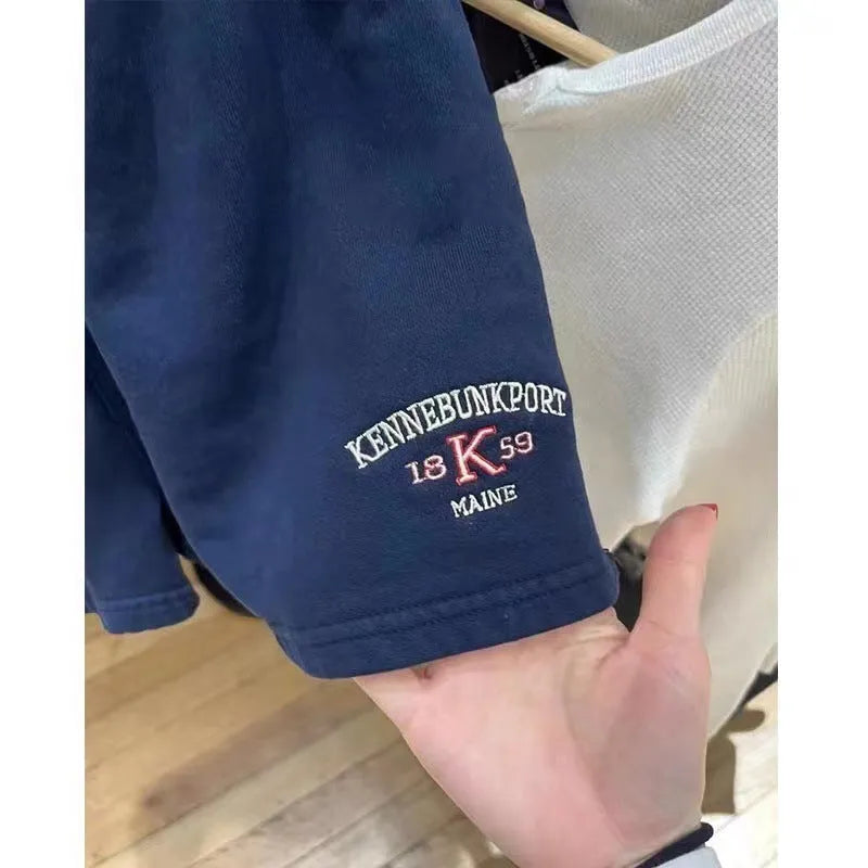 Women's cotton high top sports shorts with white flag embroidery in dark blue colour