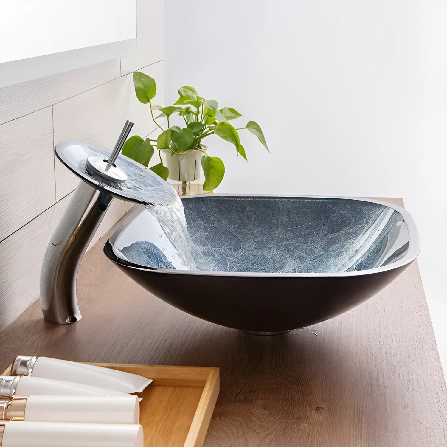 Blue grey foil tempered glass table basin for bathroom installation on a vanity unit.