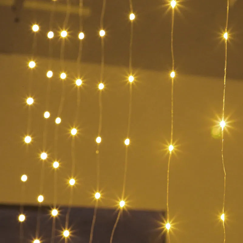 Copper curtain LED string lights with multiple beads, powered by USB cable, in a choice of colours.