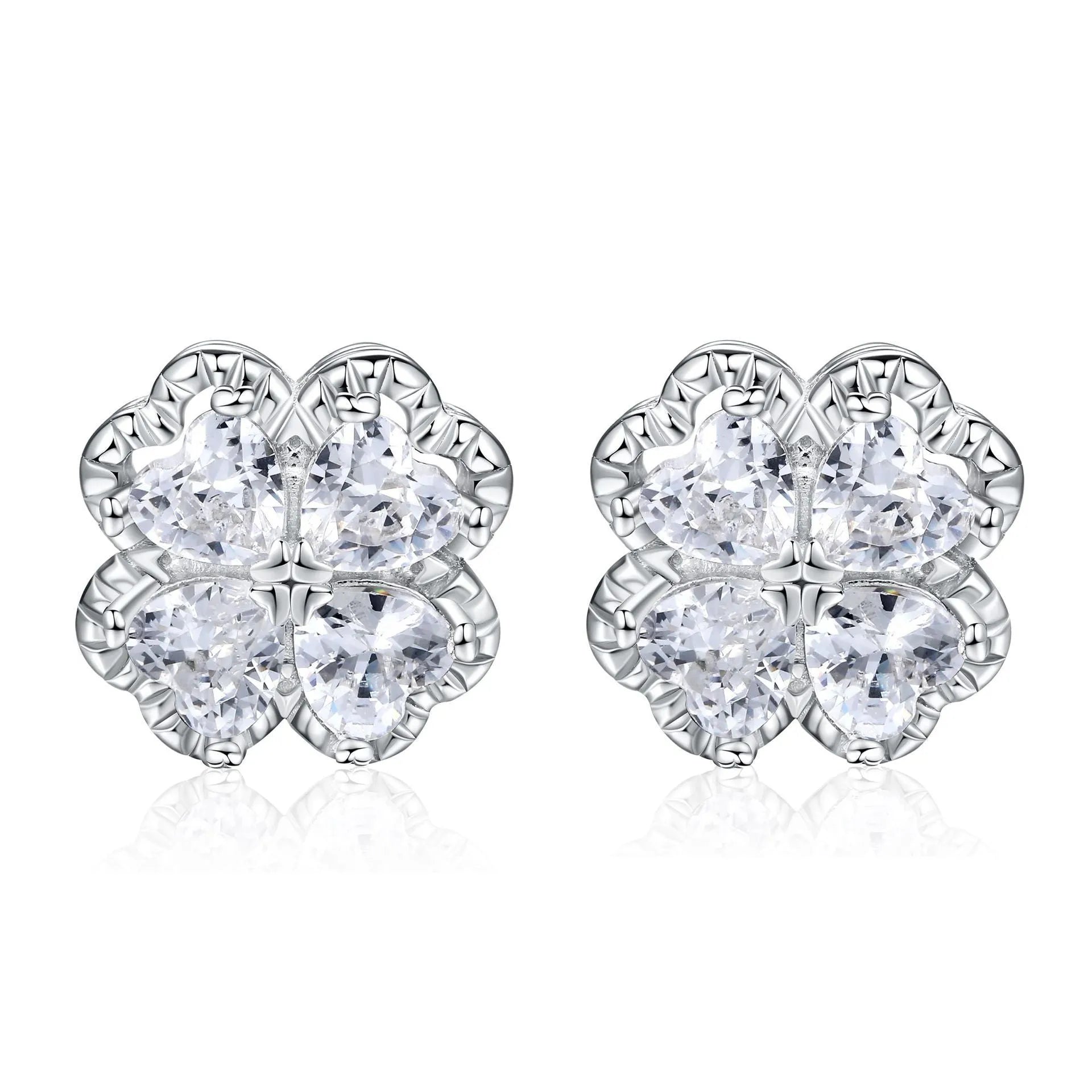 A pair of 925 silver earrings with a heart and four-leaf clover design, set with zircon stones in a white gold colour finish.