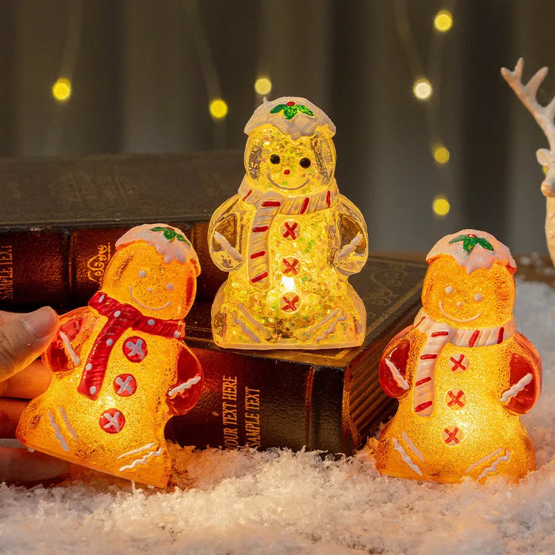 Glowing LED Christmas gingerbread man and snowman ornaments with removable scarves in different colours.