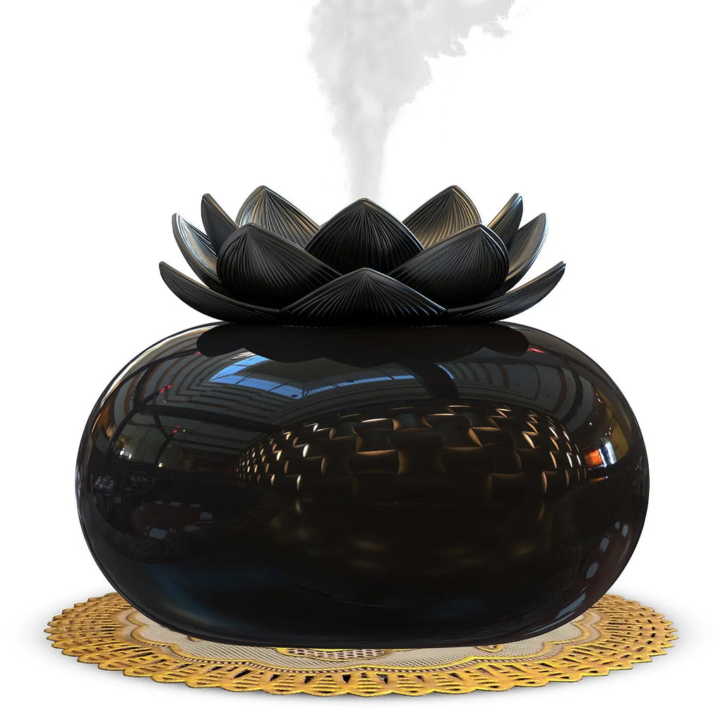 Pure black round Lotus aromatherapy humidifier with USB cable on a wooden surface.