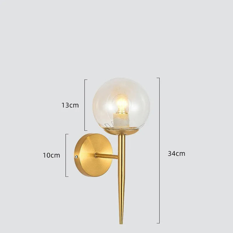 Modern copper coloured wall lamp with glass lampshade for bedroom or hallway lighting