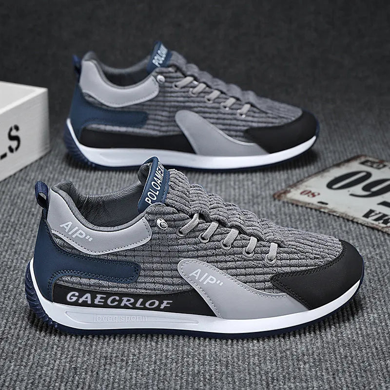 Men's grey and green mesh running shoes with viscose sole and lace-up closure