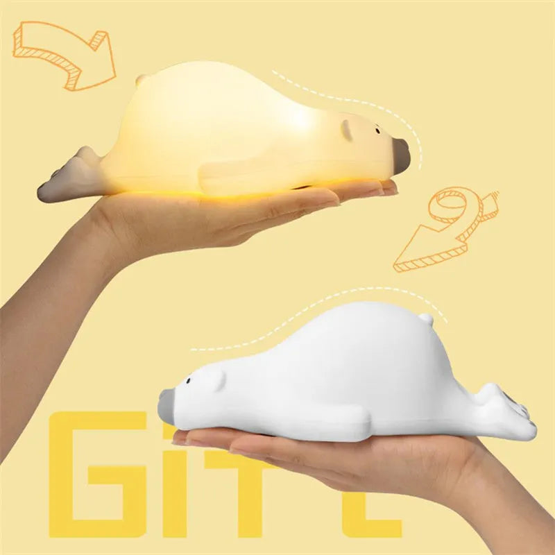 White bear silicone night light on bedside table with soft glow USB rechargeable children's lamp