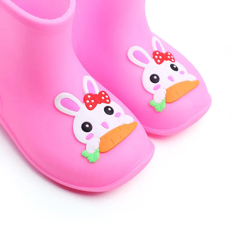 Children's short rain boots in yellow, pink, or blue with non-slip sole, waterproof PVC upper, cartoon pattern, sizes 14-18