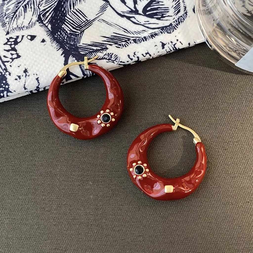 Hong Kong style retro ear studs with dripping oil texture and rhinestone decoration in black or red colour options