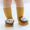 Cotton baby floor socks in assorted colours and prints like blue bow and pink stars on a size chart.