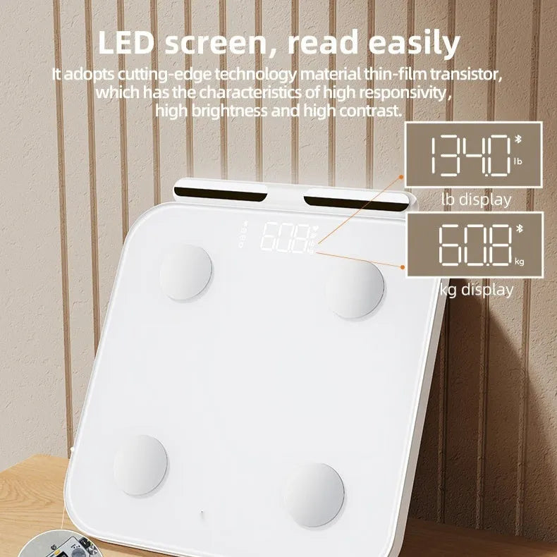 White professional body fat scale with 8 electrodes and a tempered glass platform.