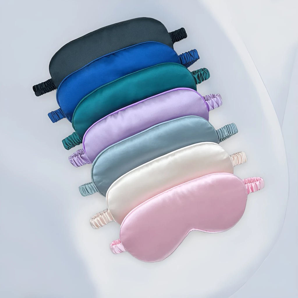 Double-sided silk-like eyeshade in rayon elastic satin shown in multiple colour options including black, beige, and wine red