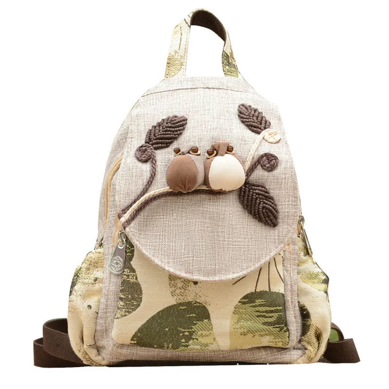 Ethnic style retro canvas backpack with floral print and outer pocket, soft construction for leisure travel